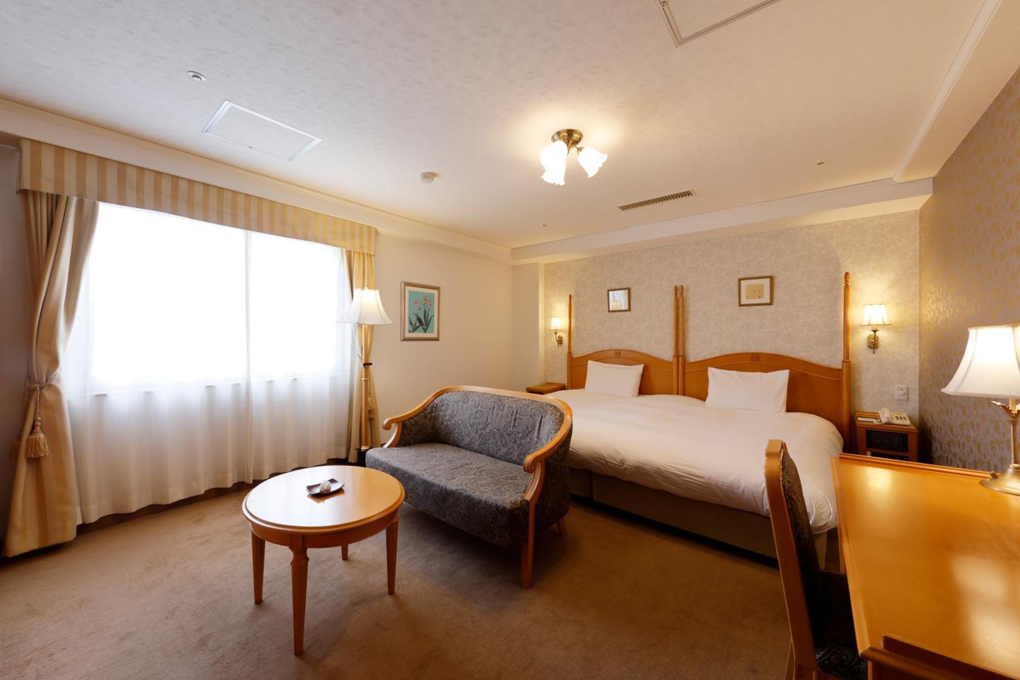 Kanazawa Hakuchoro Hotel Sanraku -Natural Hot Spring- Kültér fotó A room at the hotel